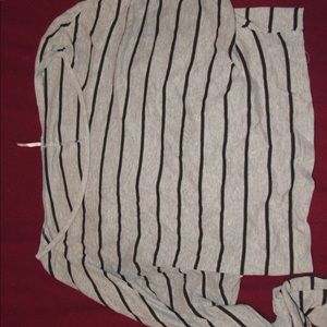 Cropped, long sleeve striped shirt.